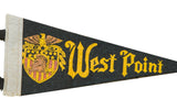 Detail of vintage West Point felt flag, with cream binding and golden eagle crest.