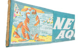 Angled view of the vintage pennant's colorful sea lion graphic and frayed fabric edge.