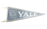 Rare vintage 1970s Yale felt pennant, faded blue-grey with white text.