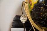 Gold Parents' Magazine commendation tag on the vintage Cram's black globe.
