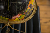 Mid Century Cram's black globe with brass meridian and original product tag.