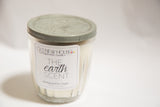 Vintage zinc lid and 'Earth Scent' label of the antique jelly jar candle.