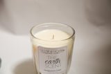 Off-white soy wax and natural wick inside the antique jelly jar candle.