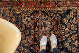 Lifestyle view of a vintage distressed Bibikabad rug, showing its scale and time-softened texture.