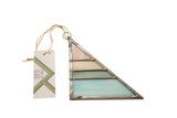 Opaque triangular Stained Glass Art with pink, cream, sage green, aqua segments, zinc-framed.