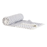 Modern gray and white handmade blanket displaying varied geometric and teardrop patterns.