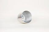 Tilted aluminum planter with brushed finish, revealing the perforated self-watering reservoir.
