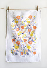 Meadow linen tea towel with screen-printed orange, yellow, blue wildflower design, 20x30.