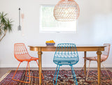 Modern Lucy side chair by Bend Goods in copper wire frame.