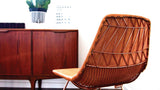 Lucy Chair camel orange hand-sewn leather pad on a copper wire frame, 17