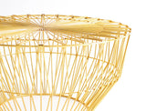 Close-up of the modern gold coffee table's intricate sunburst wire design.