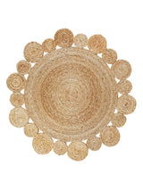 Round natural hemp rug with a daisy weave and scalloped edges, 3' diameter.