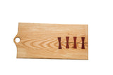 Handmade hickory cutting board, 22 inches long, with distinctive reddish-brown butterfly keys.