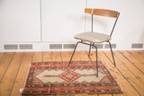 Distressed antique Malayer rug, early 20th century, with camel field, tomato red, and brown.