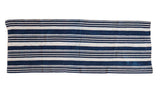 Striped Indigo Throw with hand-woven blue and cream horizontal stripes, 22x60 inches.