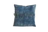 Vintage African Indigo Floor Pillow with rich, varied blue hues and an intact fringed band.