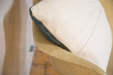African Indigo Throw Pillow, edge showing faded indigo and pale blue linen.