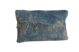 African Indigo handmade pillow with sun-faded blue textile and frayed details, 12x20 inches.
