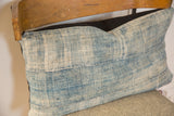 Vintage African Indigo pillow with sun-faded blue textile, textured weave, and black linen back.