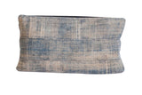 African Indigo wide lumbar pillow with sun-faded blue paneled textile.