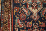 Detail of distressed Malayer runner, traditional Herati design in navy, madder red, and ivory.