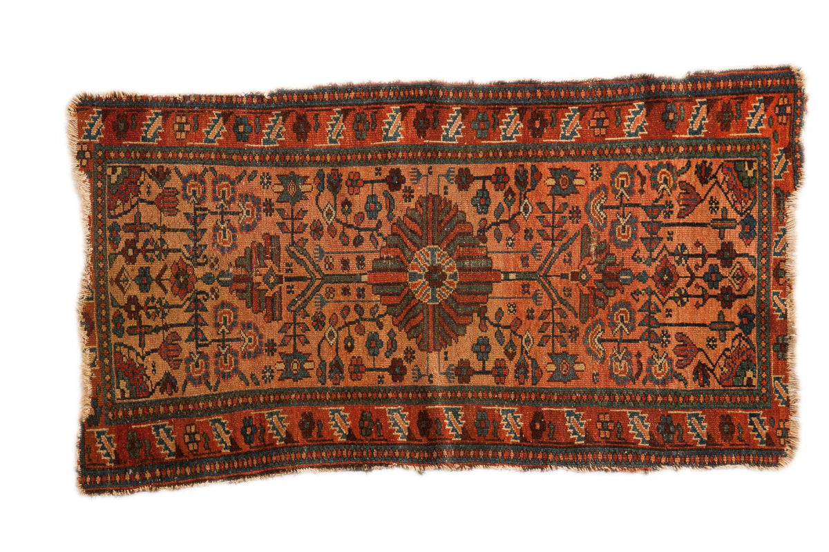 Fine vintage Malayer rug with detailed center flower, geometric tendrils, blush rose field.