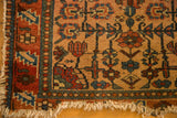 Finely woven vintage Malayer rug corner, tattered fringe, geometric floral on blush field.