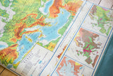 Vintage Europe map showing detail of colored population distribution and rainfall charts.