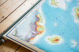 Vintage Europe pull down map featuring Greenland's colorful pictorial relief.