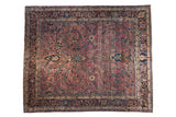 Vintage Persian Meshed carpet, aubergine tree-of-life design with blossoms and navy Safavid border.