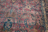 Plum field with delicate teal tendrils, blossomed flowers, and Classic Safavid border.