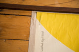 Mid Century Art Poster's top edge, linen backing, dark wood magnetic rod.