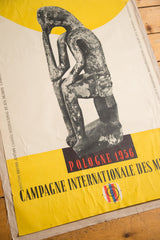 Bottom right of vintage 1956 Pologne poster, red text, colorful logo, linen mounted.