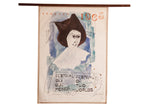 Mid Century Spoleto 1965 art poster with jester figure, muted blue, on wooden hanger.