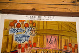 Upper portion of the Ville De Vichy poster, with title and abstract orange, blue art.