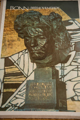 Angled view of a vintage Beethoven art poster, showing the full print and linen mount.