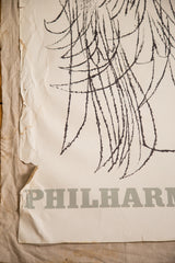 Lincoln Center poster lower left: 'PHILHAR' text, visible creases, rips, and linen backing.