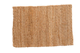 Golden hand braided natural fiber entrance mat with robust woven texture, 2'2
