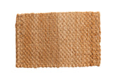 Gold hand-braided natural fiber entrance mat with a tight textured weave, 2' x 3'1