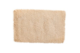Plush light beige Moroccan shag bath mat, hand woven 2' x 3'3