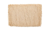 Plush hand woven light beige shag bath mat, 2x3 feet.