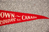 Vintage red felt Gastown Vancouver BC Canada flag with white lettering and small mark.