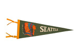 Vintage green felt pennant with white Seattle text and colorful headdress graphic.