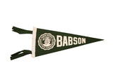 Dark green vintage felt Babson Institute pennant with off-white emblem.