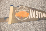 Faded vintage Nebraska felt flag with 'House of Yesterday' graphic and beige binding.