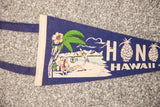 Blue felt Honolulu Hawaii flag featuring a vintage beach scene and pineapple O's.