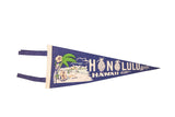 Vintage 1940s Honolulu Hawaii felt flag, navy blue with a beach scene.
