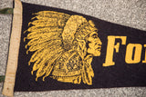 Aged yellow graphic of feathered headdress and 