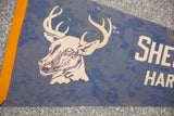 Vintage Sherwood Forest Zoo felt flag detail: stylized deer head, blue felt, orange border, signs of age.