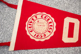 Vintage red felt Olivet College flag with cream seal and large 'O' detail.